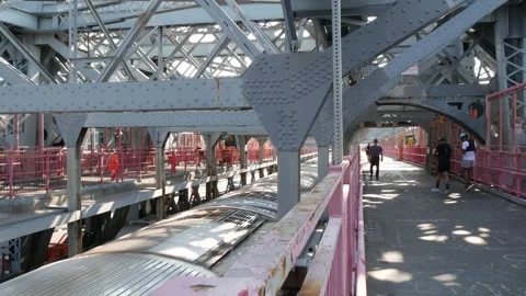 Williamsburg Bridge in Brooklyn, New York City USA. People run on bridge near Stock Footage 346603702