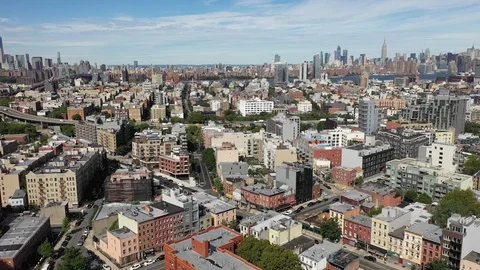 Williamsburg rooftops and the Williamsburg Bridge in Brooklyn Stock-Footage 95698772