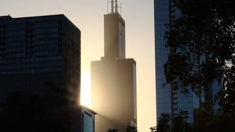 Willis Tower Sears Tower in Chicago city, illuminated by the warm glow of Stock Footage 320448453