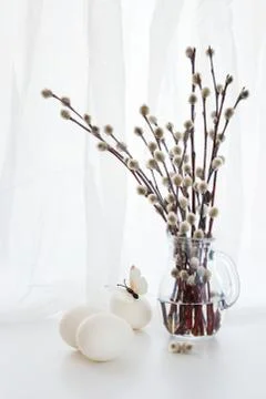 Willow branches and Easter eggs Stock Photos