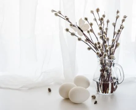 Willow branches and Easter eggs Stock Photos