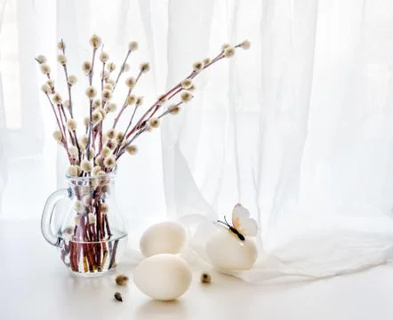 Willow branches and Easter eggs Stock Photos