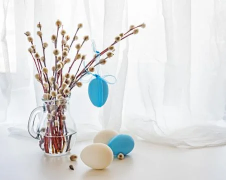 Willow branches and Easter eggs Stock Photos
