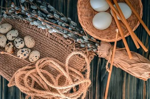 Willow branches and eggs on the table 스톡 사진