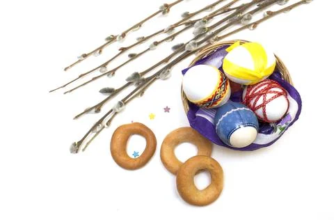 Willow branches with festive eggs in the nest. Photo. Stock Photos
