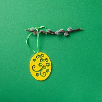 Willow twig with yellow easter decorative egg Stock Photos
