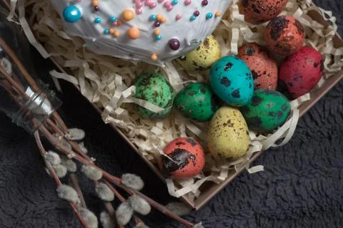 Willow twigs and eggs with Easter cake Stock Photos