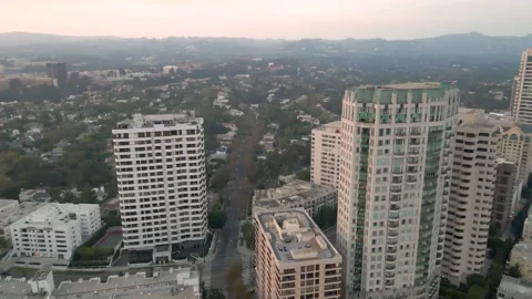 Wilshire Corridor High-Rises and Hills, Los Angeles, Aerial Orbit, 4K Stock Footage 145707762