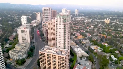 Wilshire Corridor Tower Cluster and Rooftops, Extended Aerial Orbit, 4K Stock Footage 145708192