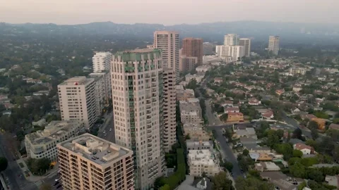 Wilshire Corridor Tower Rows and Tree-Lined Streets, Aerial View, 4K Stock Footage 145707865