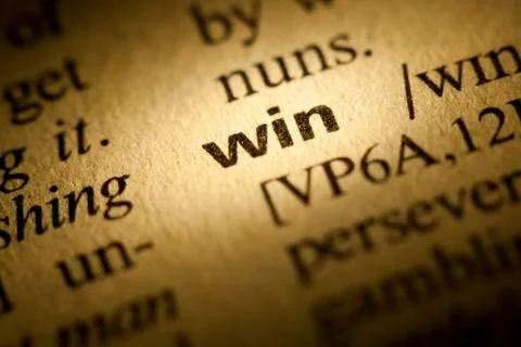 Win meaning in dictionary Stock Photos