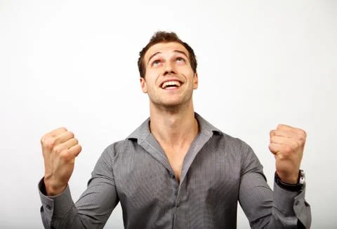 Win or succes concept - man happy for his luck Stock Photos