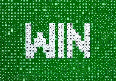 WIN spelled with dice Stock Photos