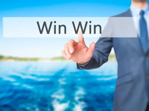 Win Win - Businessman hand touch  button on virtual  screen interface 写真素材