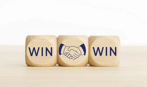 Win Win concept. Text and handshake Icon on wooden blocks. Copy space Stock Photos