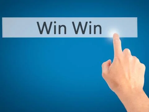 Win Win - Hand pressing a button on blurred background concept on visual scre 스톡 사진