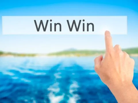 Win Win - Hand pressing a button on blurred background concept on visual scre 스톡 사진
