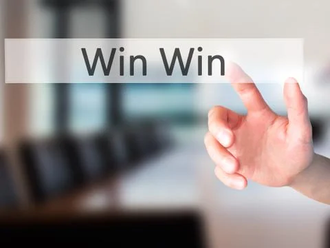 Win Win - Hand pressing a button on blurred background concept on visual scre 스톡 사진