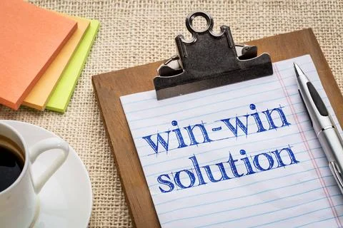Win-win solution concept win-win solution concept - handwriting on a clipb... 스톡 사진