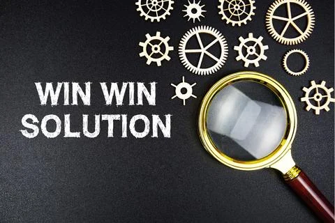 Win Win Solution text message with magnifying glass on black background Stock Photos