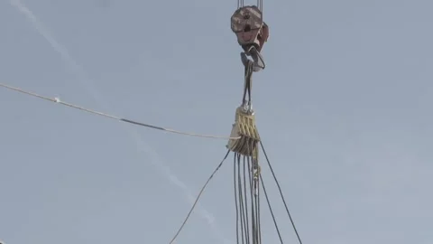 Winch pulling, cables, bridge construction Stock Footage 276968354