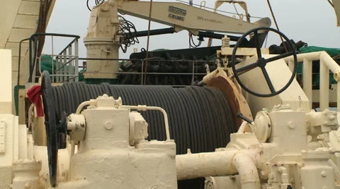 Winch pulls the network on a fishing trawler Stock Footage 63125673