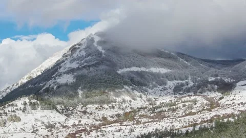 Wind and clouds blow on the top of the mountain Stock-Footage 153107719