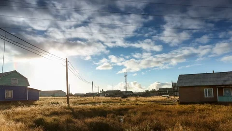 Wind and clouds, Russian village Stock Footage 105897067