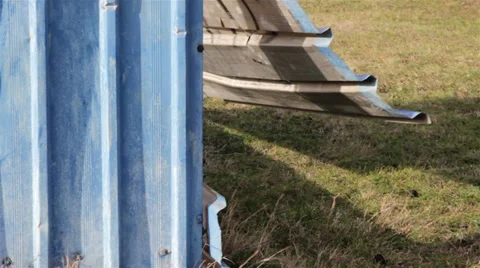 Wind and Old Tin Bench Stock Footage 32142894
