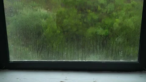 Wind and rain on a wndow Video stock 234711215