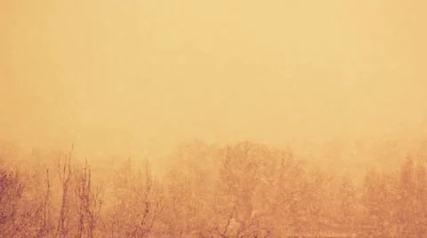 Wind and snow on blue sky background Stock Footage 5088779