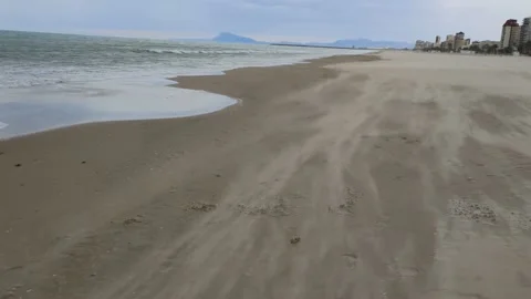 Wind and strong sand on a beach. sandstorm on the beach Stock Footage 133198099