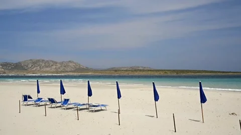 Wind on beach Sunshades Stock Footage 50255954