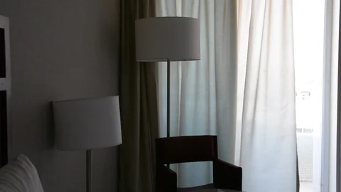 The wind blew the white curtains at the windows on deck. Видео 106346925