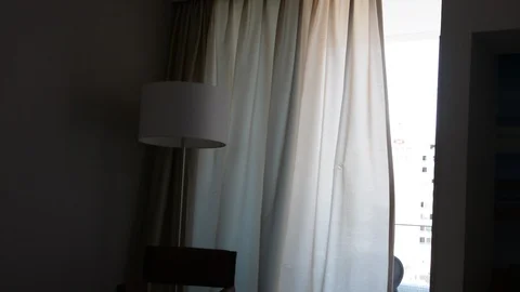 The wind blew the white curtains at the windows on deck. Видео 106346990
