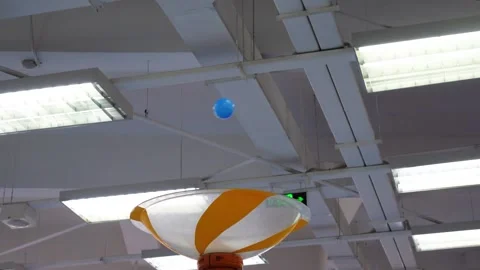 A wind blower toy that can fly plastic balls as if they were floating in th.. Stock Footage 275315658