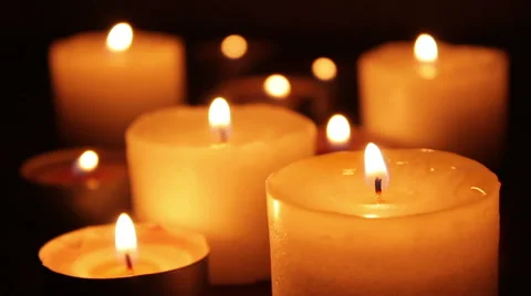 Wind blowing on candles Stock Footage 47255167