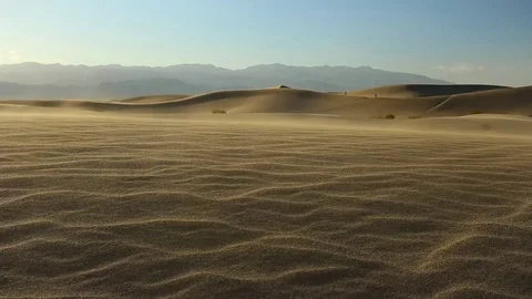 Wind blowing on mesquite flat sand dunes Stock Footage 82304644