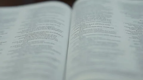 Wind blowing the pages of a Bible Video stock 64112590