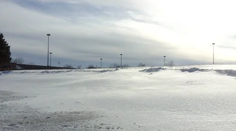 Wind blowing snow from drifts Stock Footage 34398558