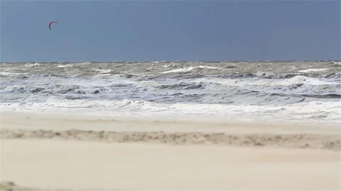 Wind blown sand on a deserted beach Stock Footage 89651806