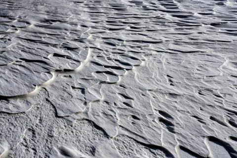 Wind blown snow patterns Stock Photos