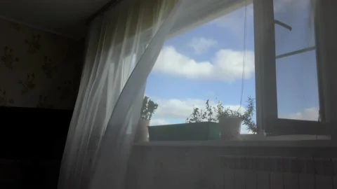 The wind blows the curtain from the window Stock Footage 138711744