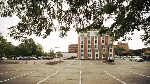 Wind blows green branches on the yard before the inn Stock Footage 68681123