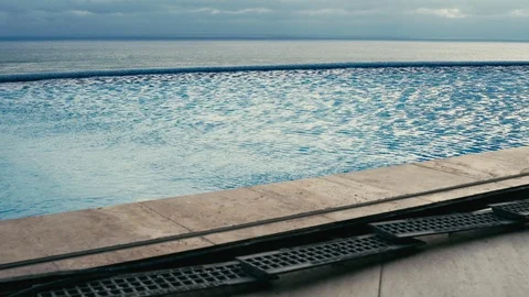 The wind blows over the surface of the pool Stock Footage 99077350