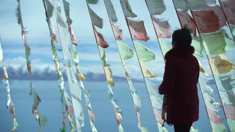 The wind blows the prayer flags and flutters the Tibetan prayer flags Stock Footage 243064859