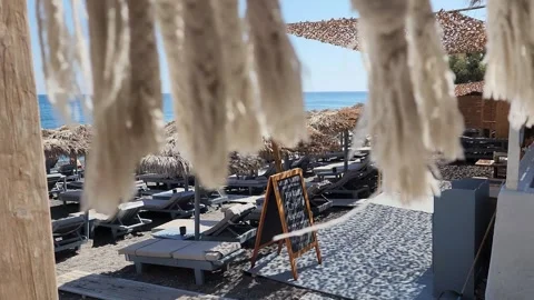 Wind blows rope drapes on the Beach in Italy Stock Footage 274109939