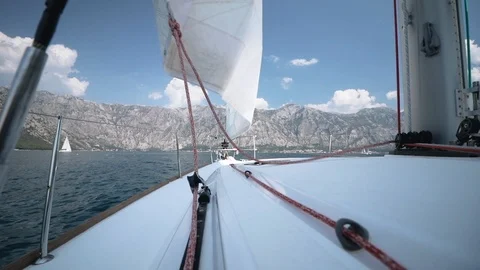 The wind blows into a sail. Sail throws in different directions. Stock Footage 108883003