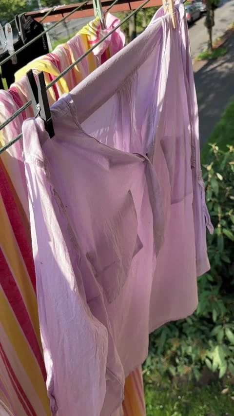 The wind blows wet laundry on the clothesline Video stock 311913739