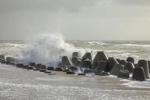 Wind breaker at the coast in Sylt in bad weather, Hoernum Stock Photos
